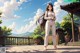 A woman with long hair standing on a patio.